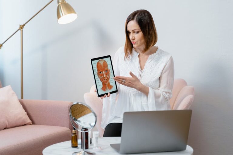 Professional woman explaining facial anatomy using a digital tablet in a modern office setting.