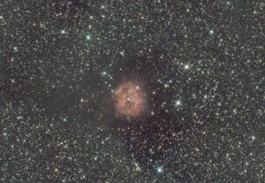 A breathtaking view of the Rosette Nebula surrounded by countless stars in the night sky.