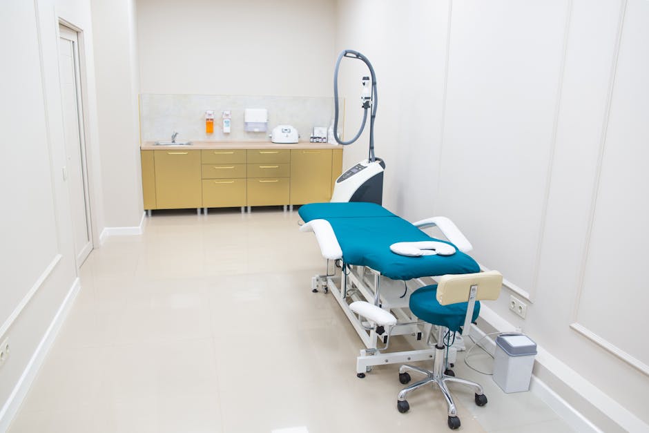 A clean, well-equipped medical examination room with state-of-the-art equipment and sterile environment.